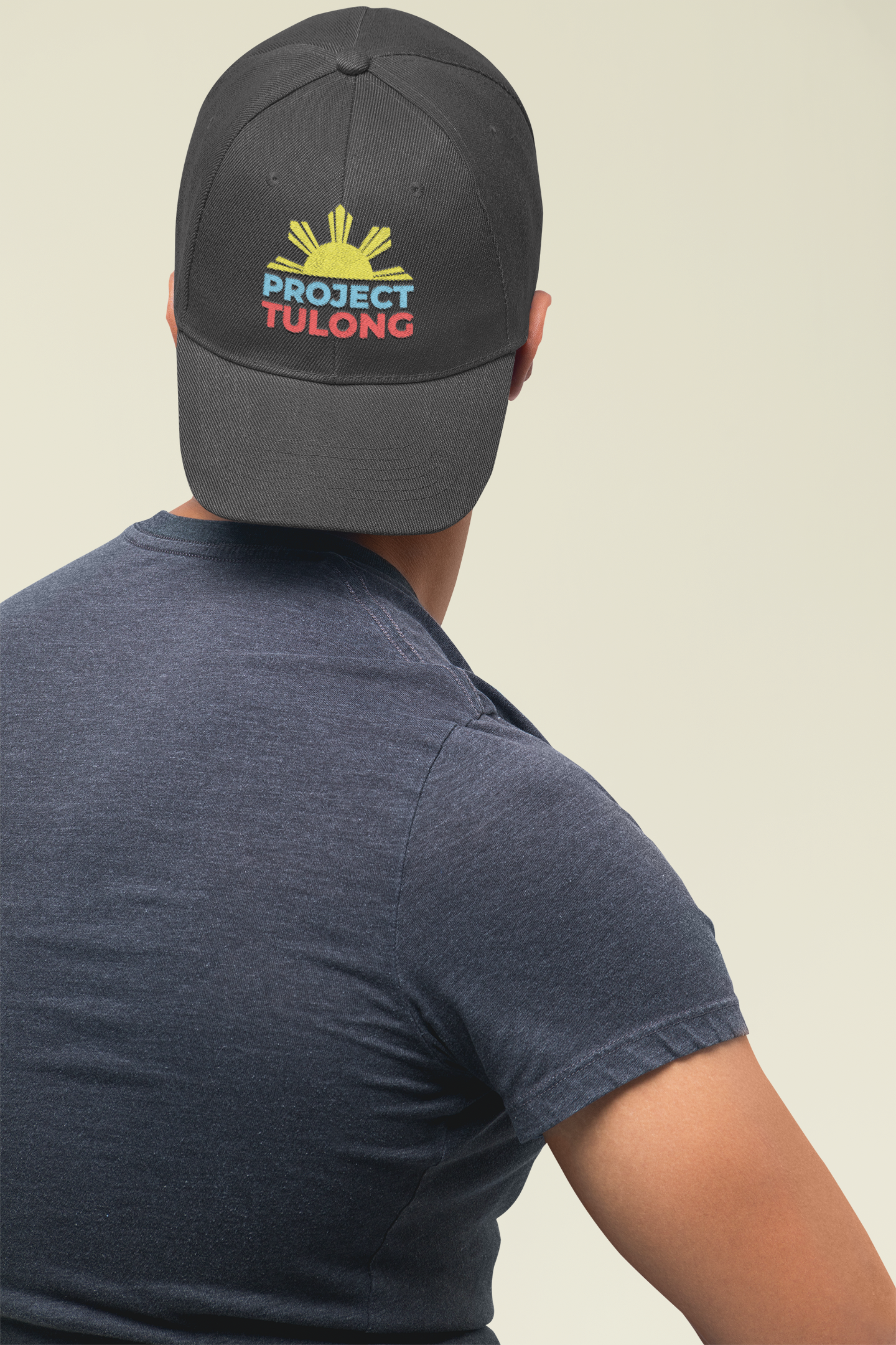 mockup-of-a-man-facing-the-wall-wearing-a-dad-hat-in-a-studio-27043 (1)